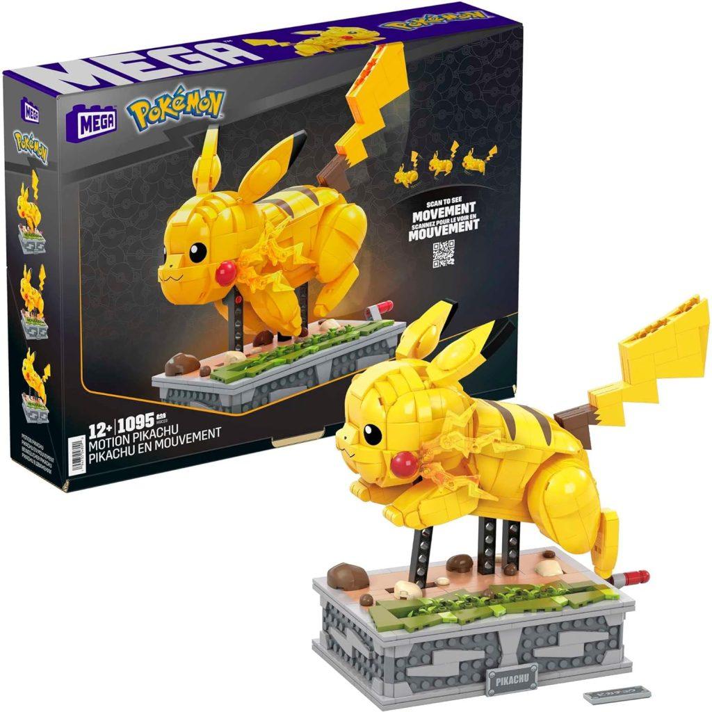 Pikachu toy running on a rocky base with a crank