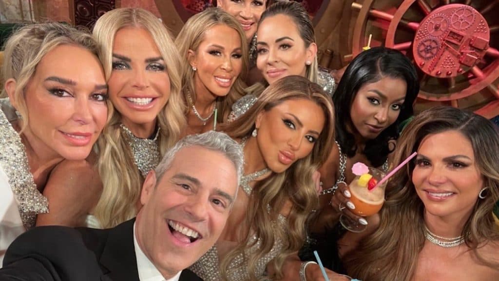 Andy Cohen with the Real Housewives of Miami during the Season 5 reunion.