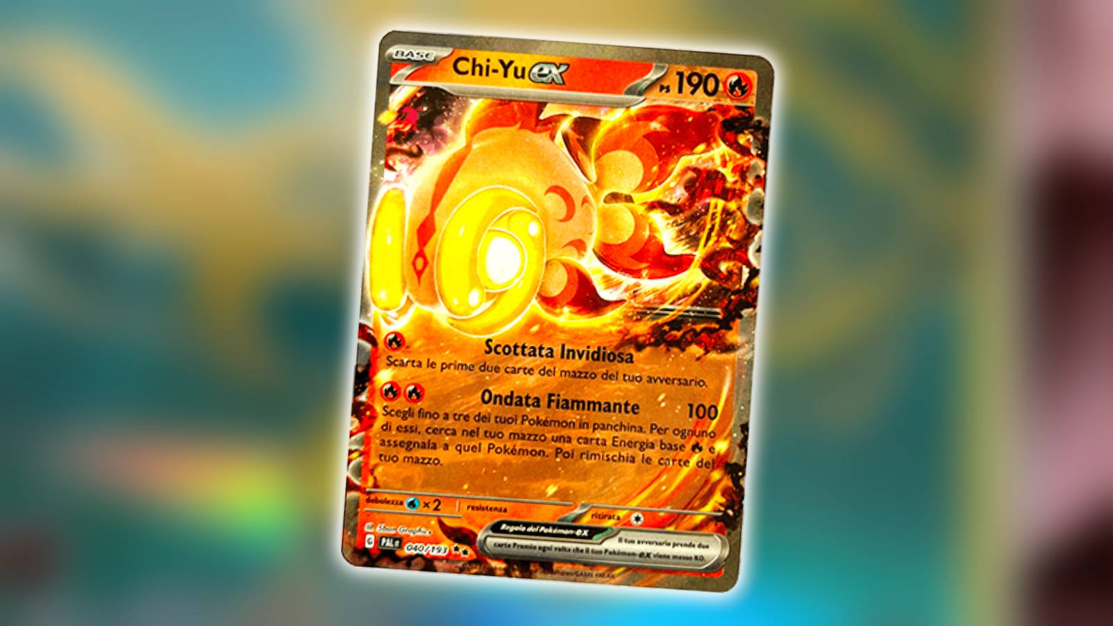 A Pokemon TCG Chi-Yu card is shown against a blurred background