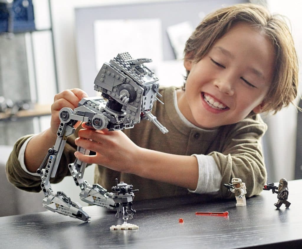 Child playing with the LEGO Star Wars Hoth Combo Pack.