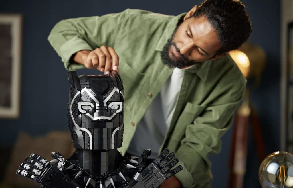 Marvel fan completing the Black Panther-inspired LEGO Marvel set.