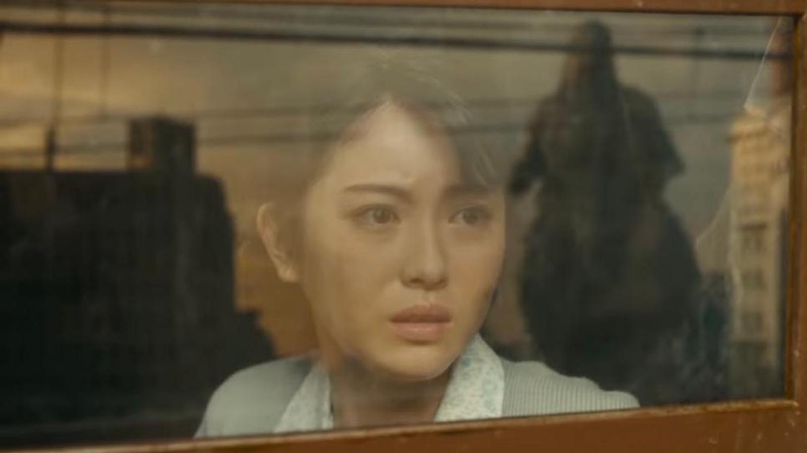 Noriko and Godzilla's reflection in Godzilla Minus One