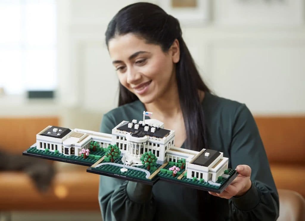 Adult looking at the LEGO Architecture The White House set.