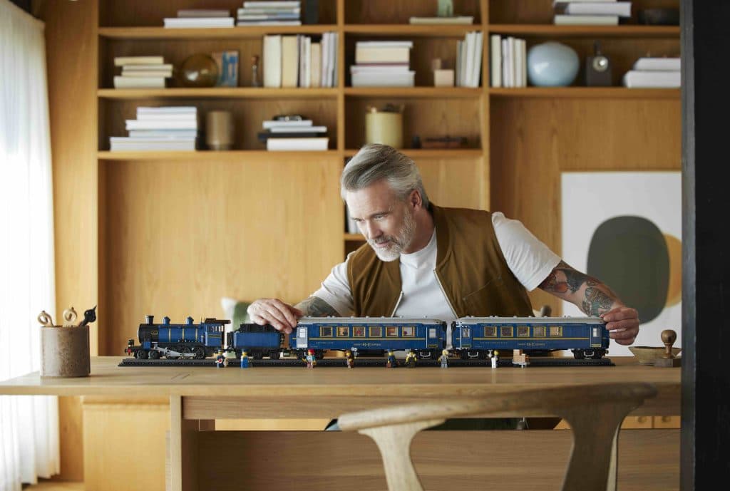 Adult looking at the LEGO Ideas The Orient Express set.