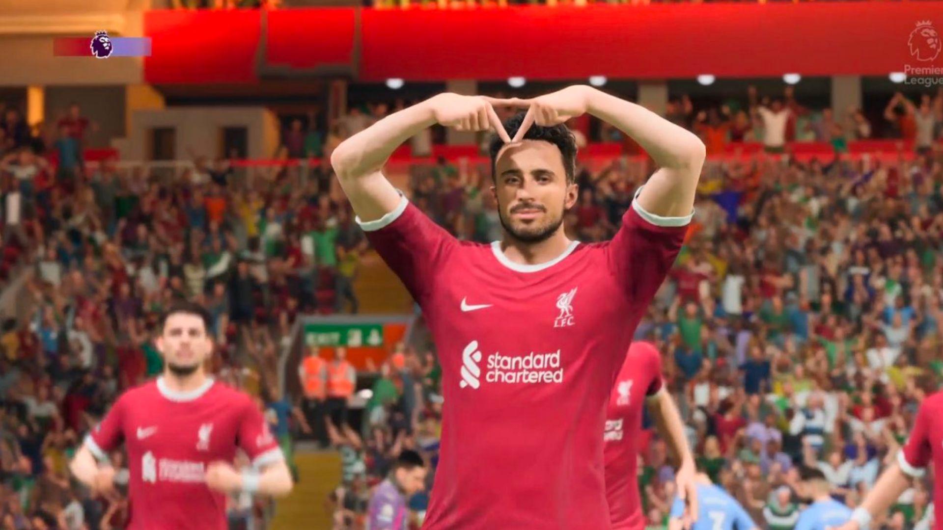 Diogo Jota in Liverpool doing EA SPORTS FC celebration with Triangle logo