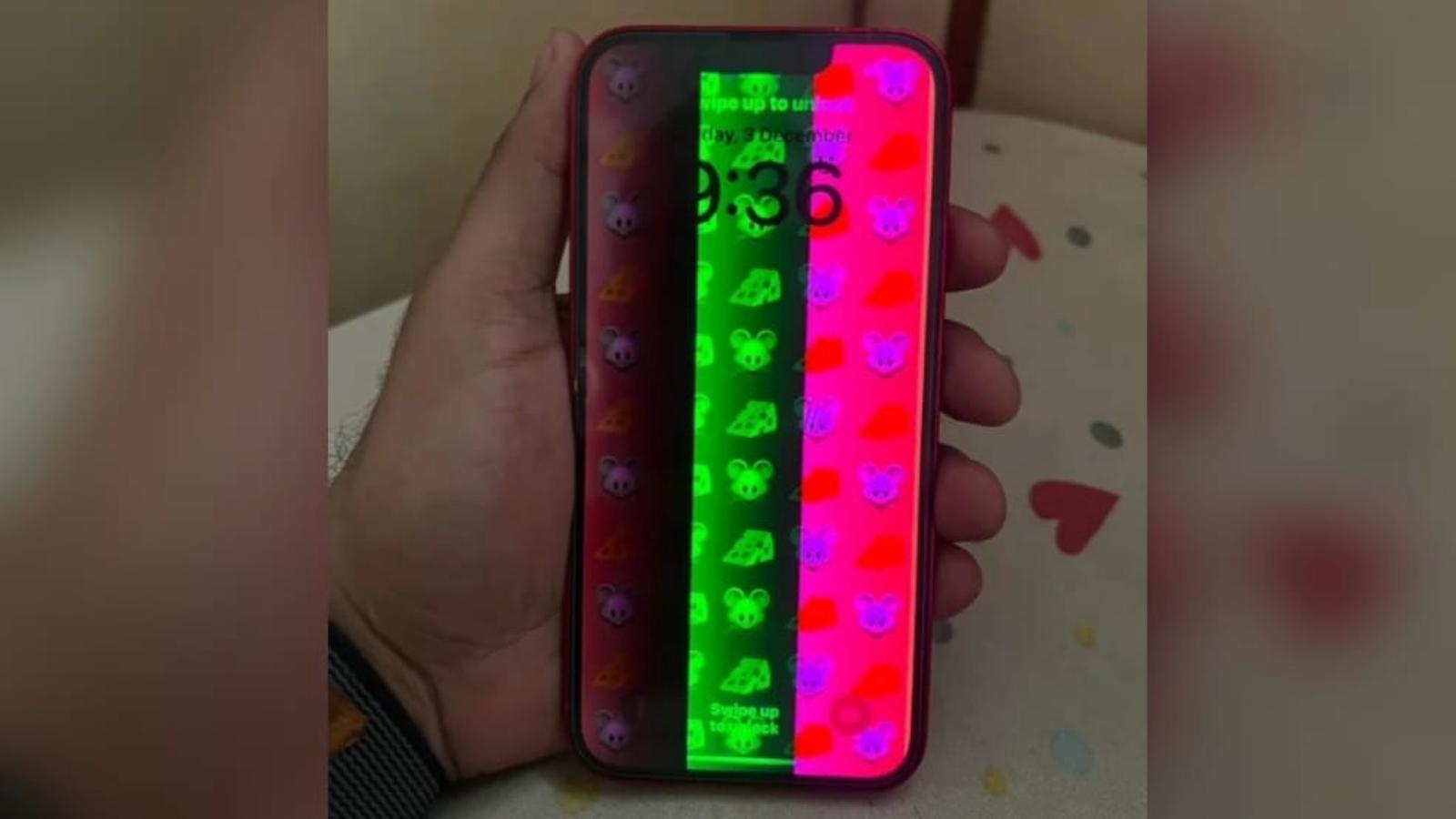 iPhone 13 with multicolored lines on the display