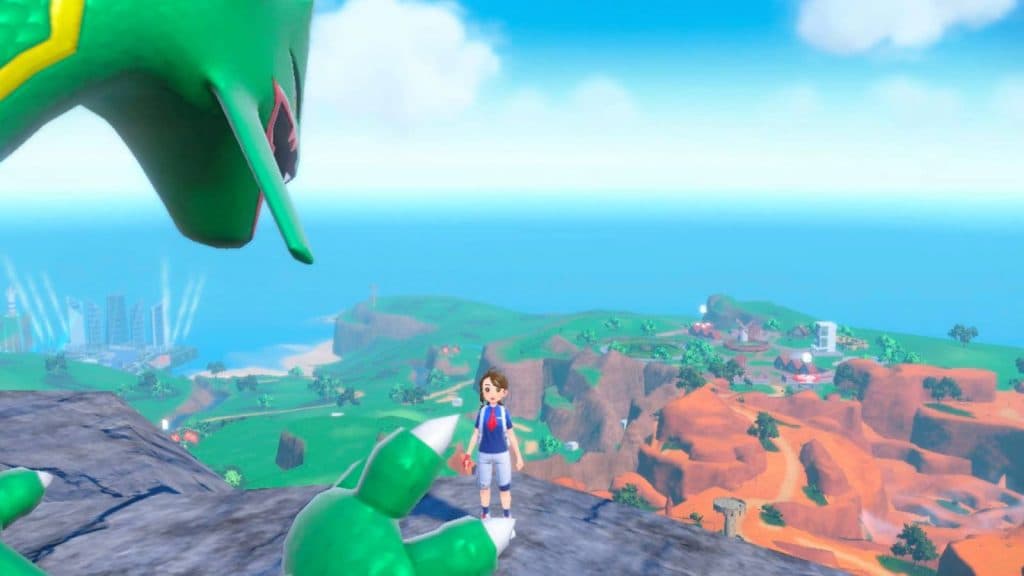 A pokemon trainer approaches the legendary Pokemon Rayquaza