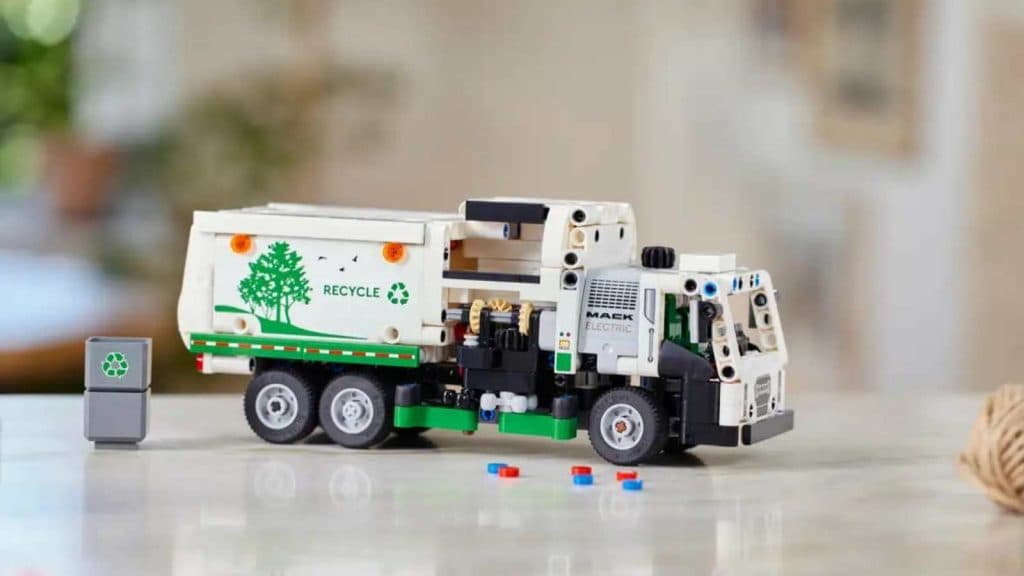 The LEGO-reimagined Mack LR Electric Garbage Truck on display.