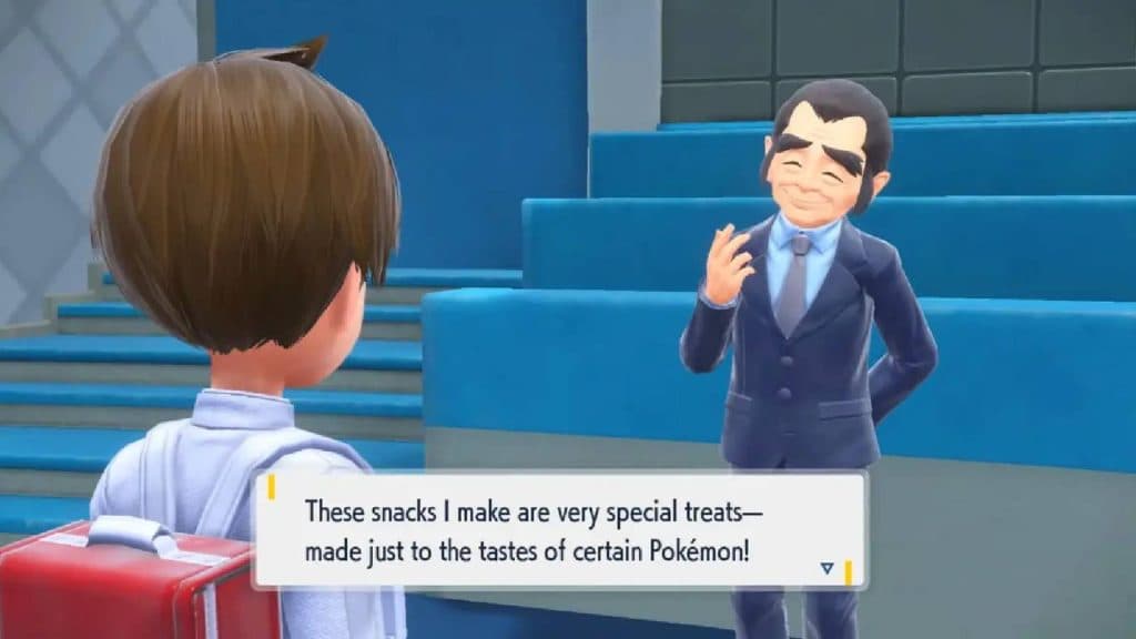 A Pokemon trainer talks to the character Snacksworth