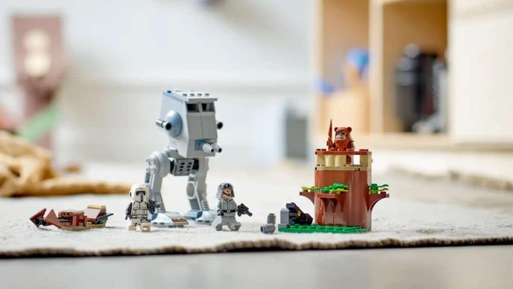 LEGO-reimagined AT-ST walker, alongside an Ewok hideout and Speeder bike.
