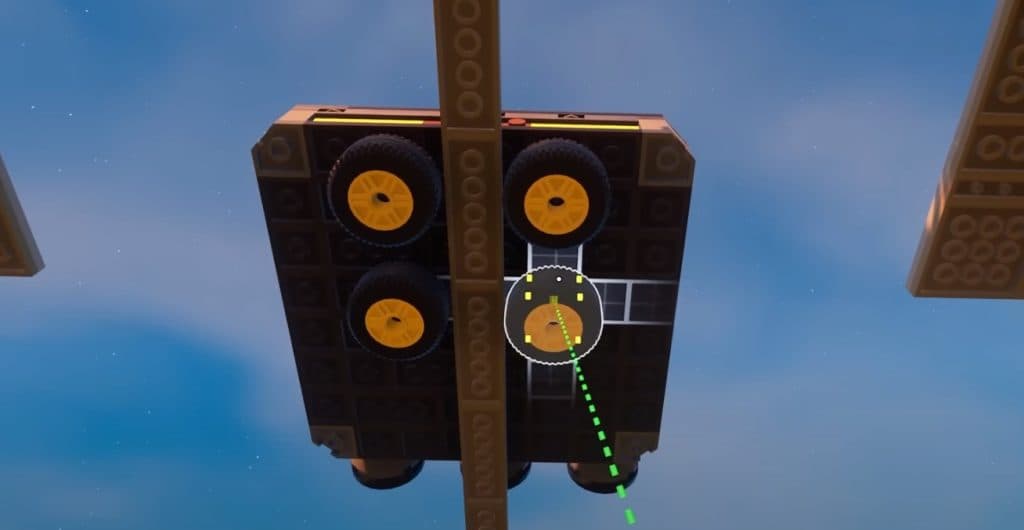 LEGO Fortnite player placing wheels beneath their monorail platforms.