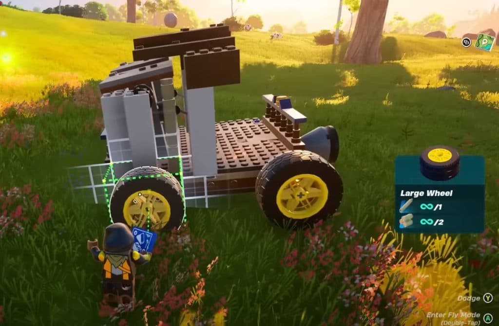 LEGO Fortnite player putting wheels on their car build.