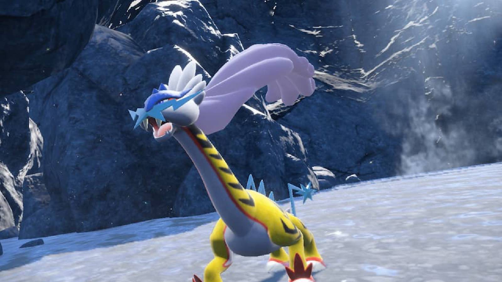 The Pokemon Raging Bolt appears in a rocky clearing