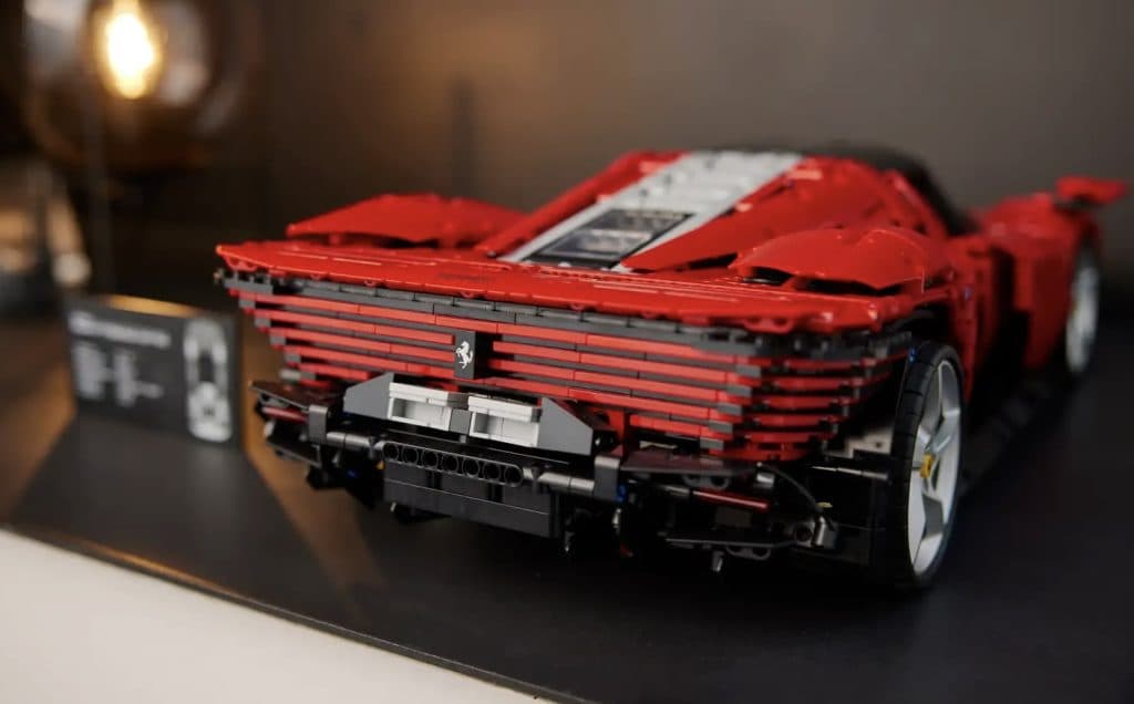 LEGO Technic Ferrari Daytona SP3 displayed on a shelf