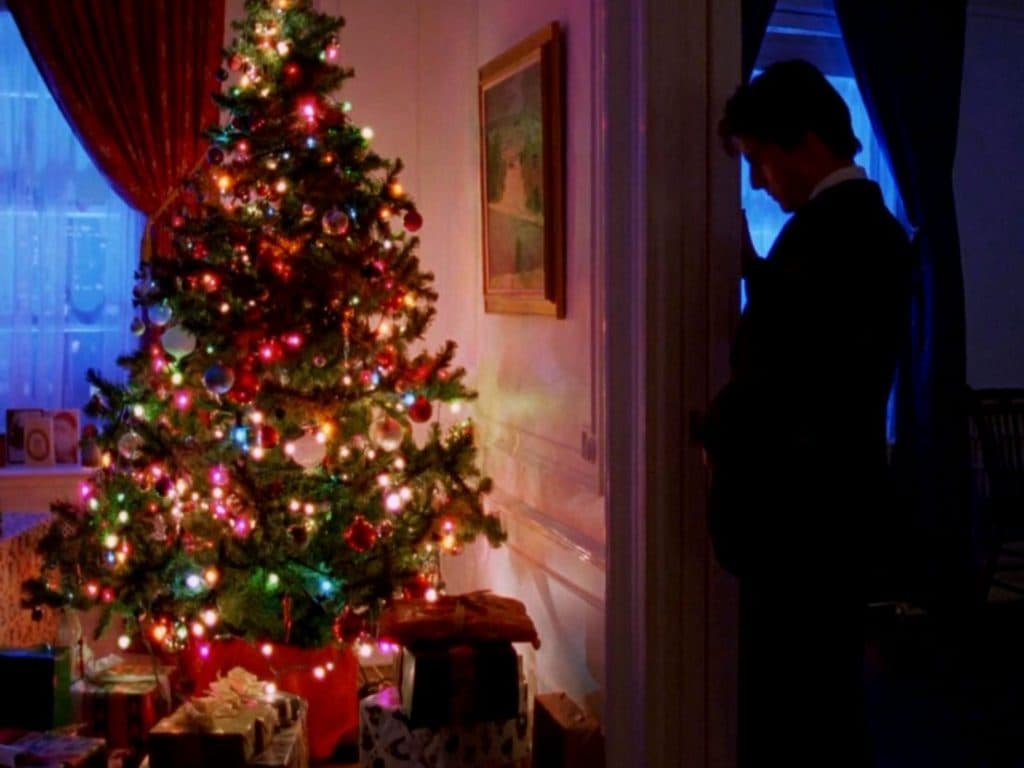 A still of Tom Cruise and a Christmas tree from Eyes Wide Shut