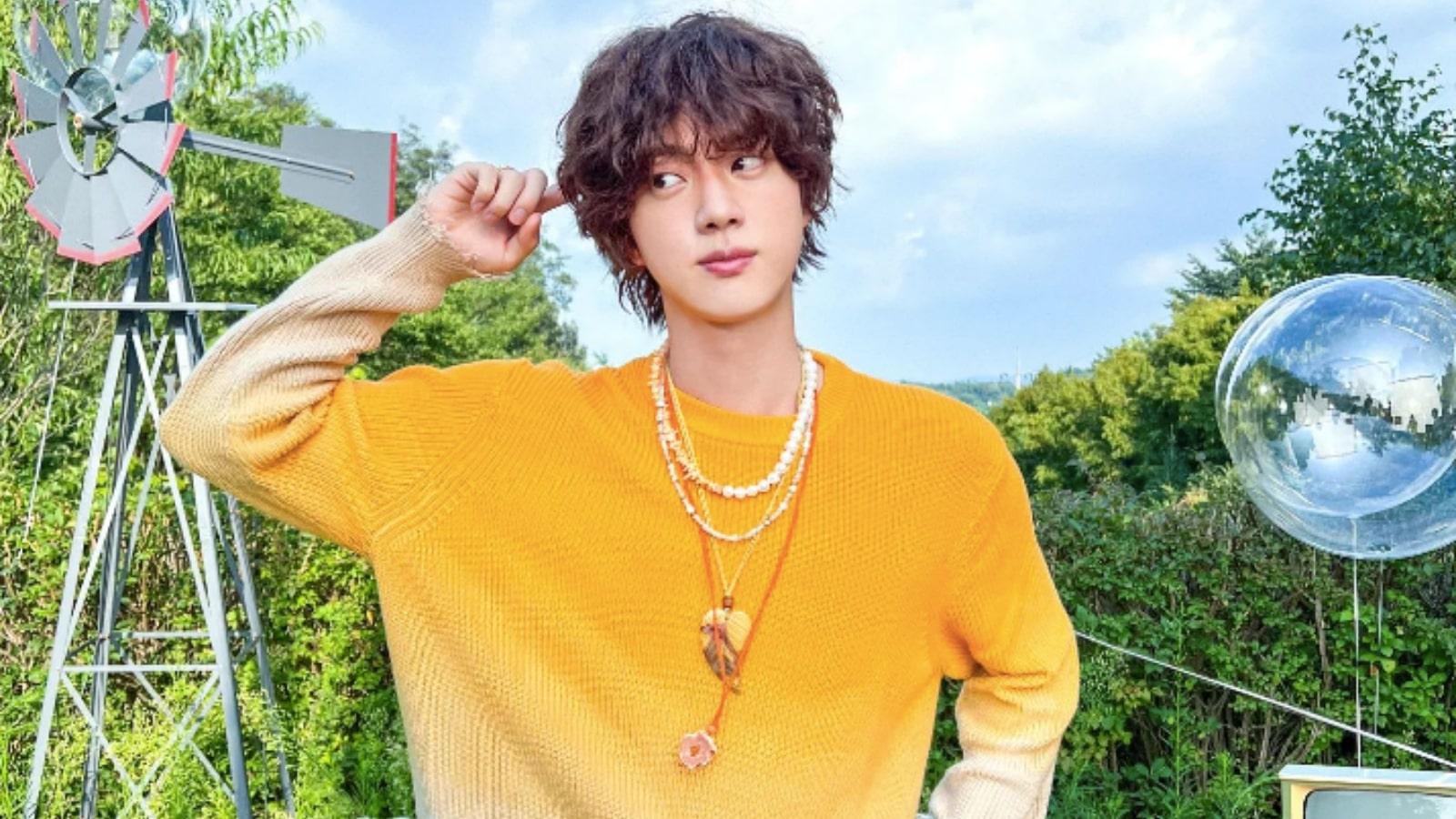 BTS' Jin poses in yellow on Instagram