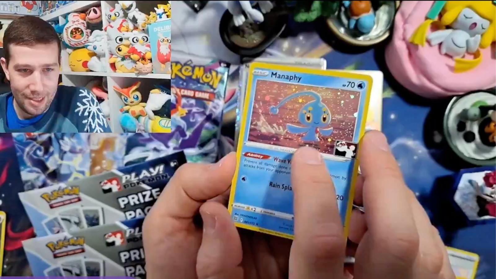 Pokemon twitch streamer holding a rare card