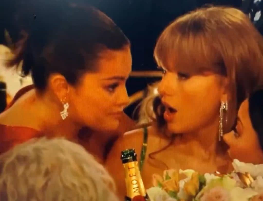Selena Gomez and Taylor Swift sitting at the Golden Globes