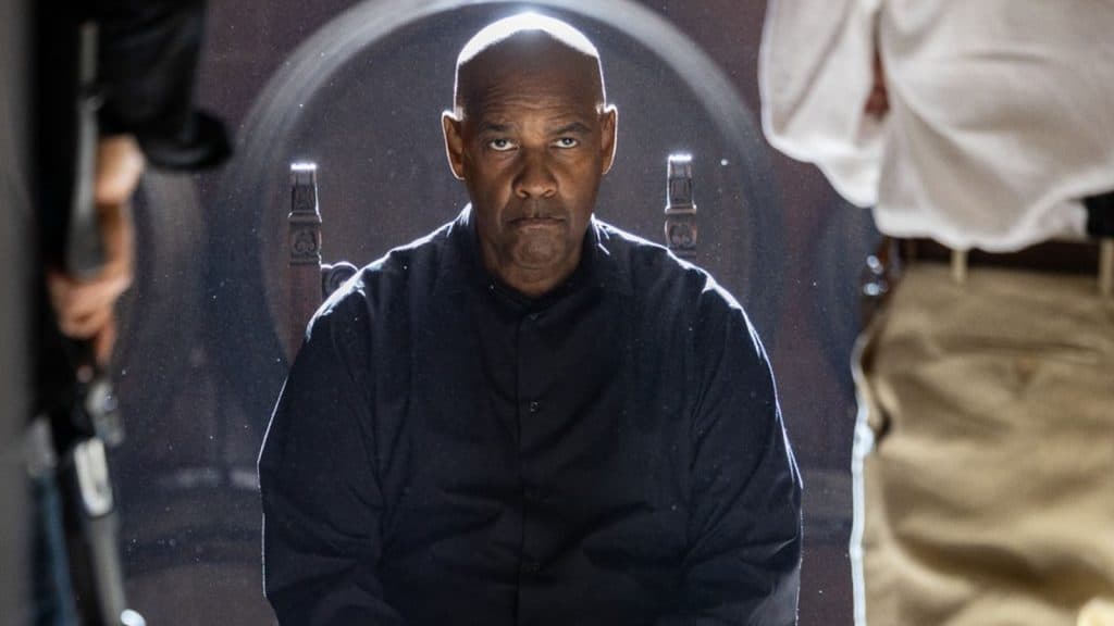 Denzel Washington sitting in a chair in The Equalizer 3.