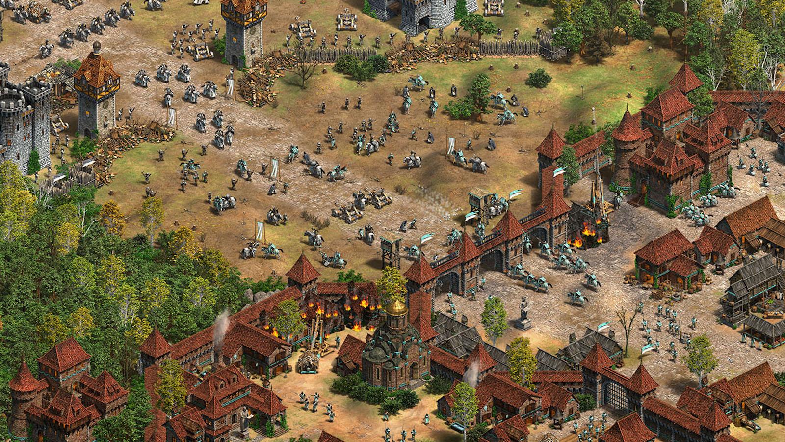 Age of Empires II soldiers attacking town
