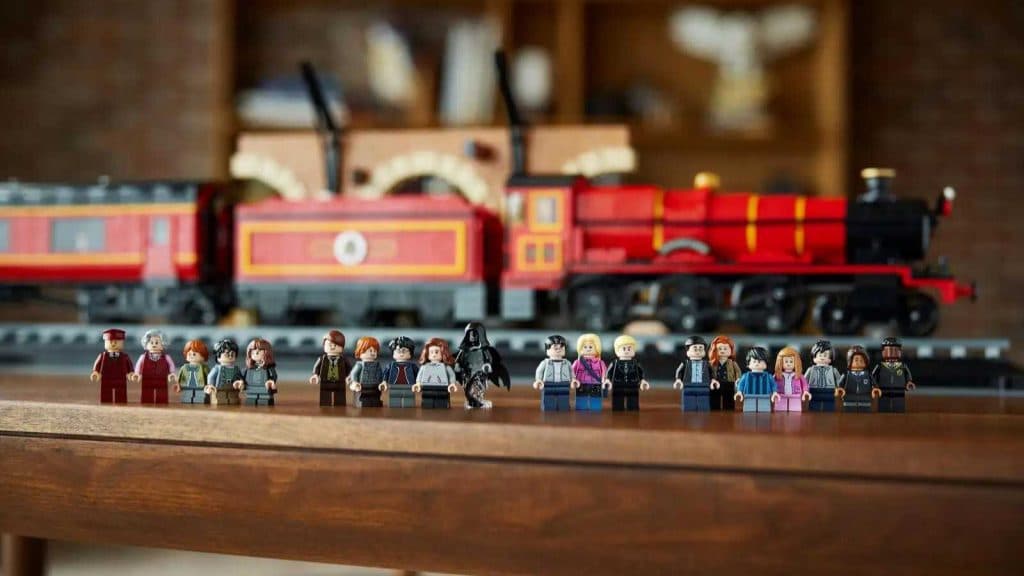 LEGO Harry Potter minifigures displayed in front of the LEGO Harry Potter Hogwarts Express — Collectors’ Edition.
