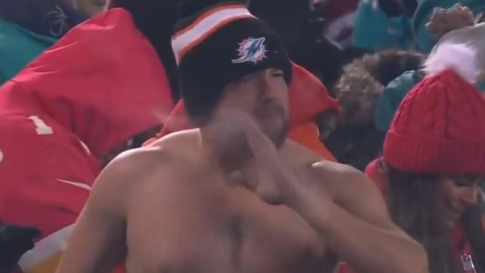 NFL fan topless wearing Miami Dolphins beanie at Kansas City Chiefs game