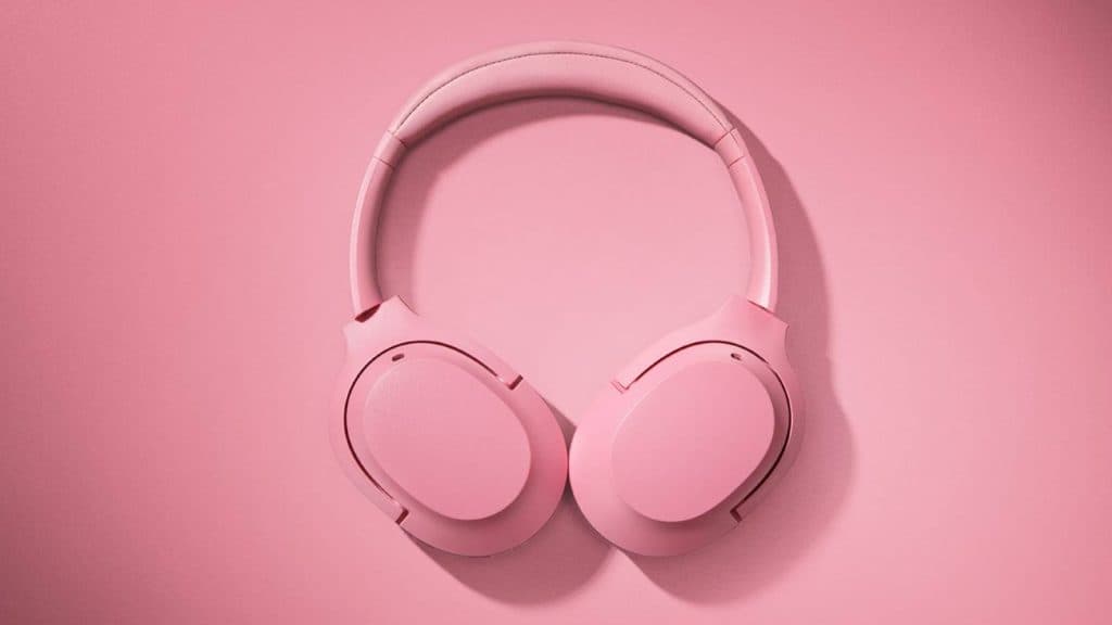 Image of the Rose Quartz Razer Opus X headset, on a matching pink background.