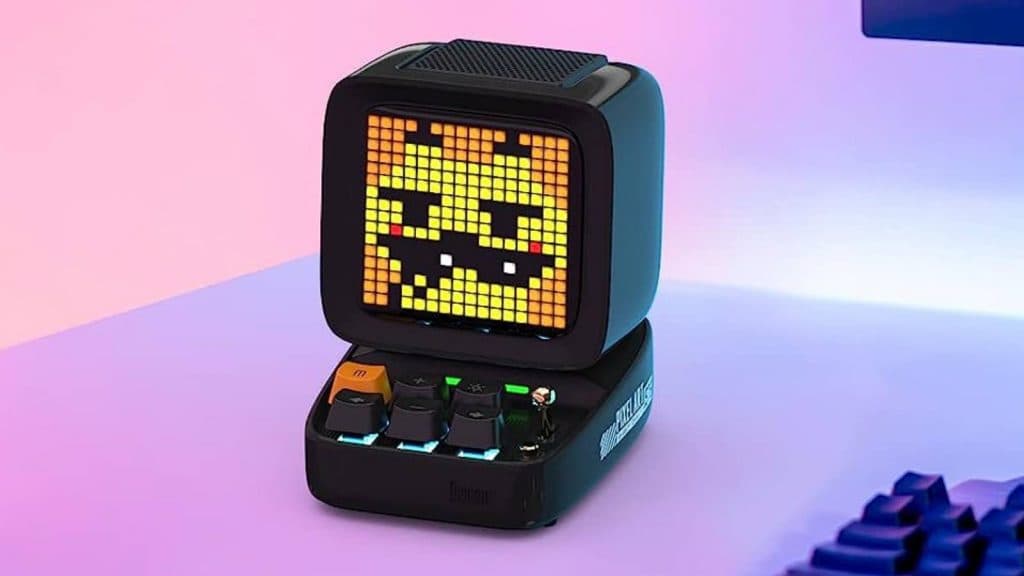 Image of the Divoom Ditoo Retro Pixel Art Game Bluetooth Speaker on a desk.