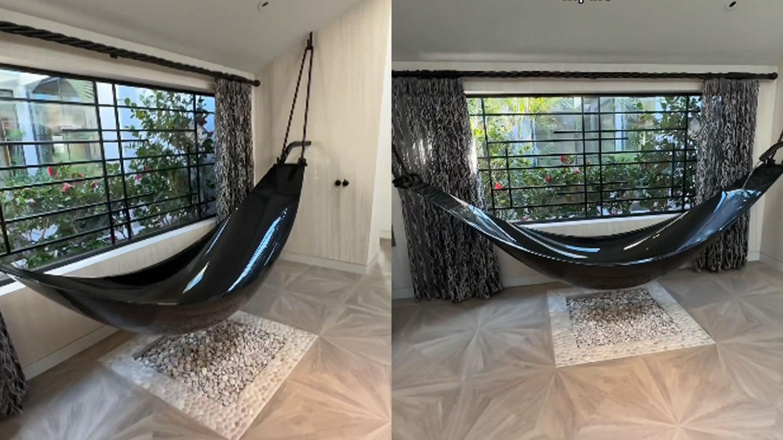 Carbon fiber hammock bathtub hanging from ceiling