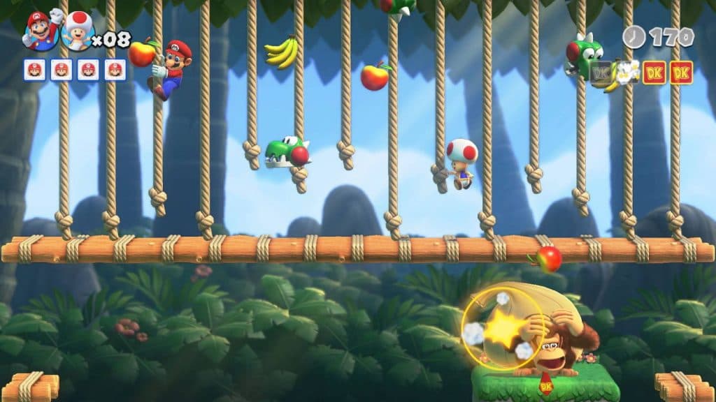 Mario and a Toad traverse a series of ropes to try and drop fruits on Donkey Kong