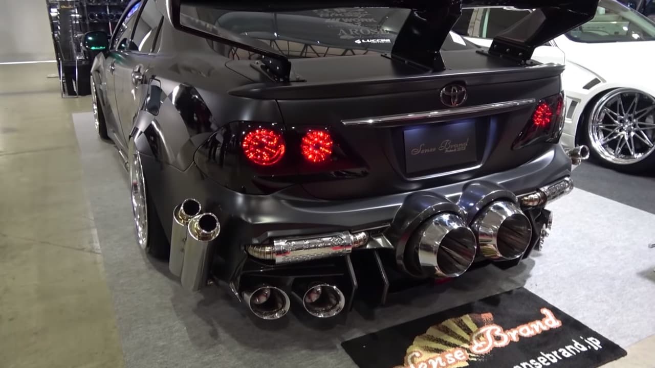 Toyota vehicle with several exhausts on it
