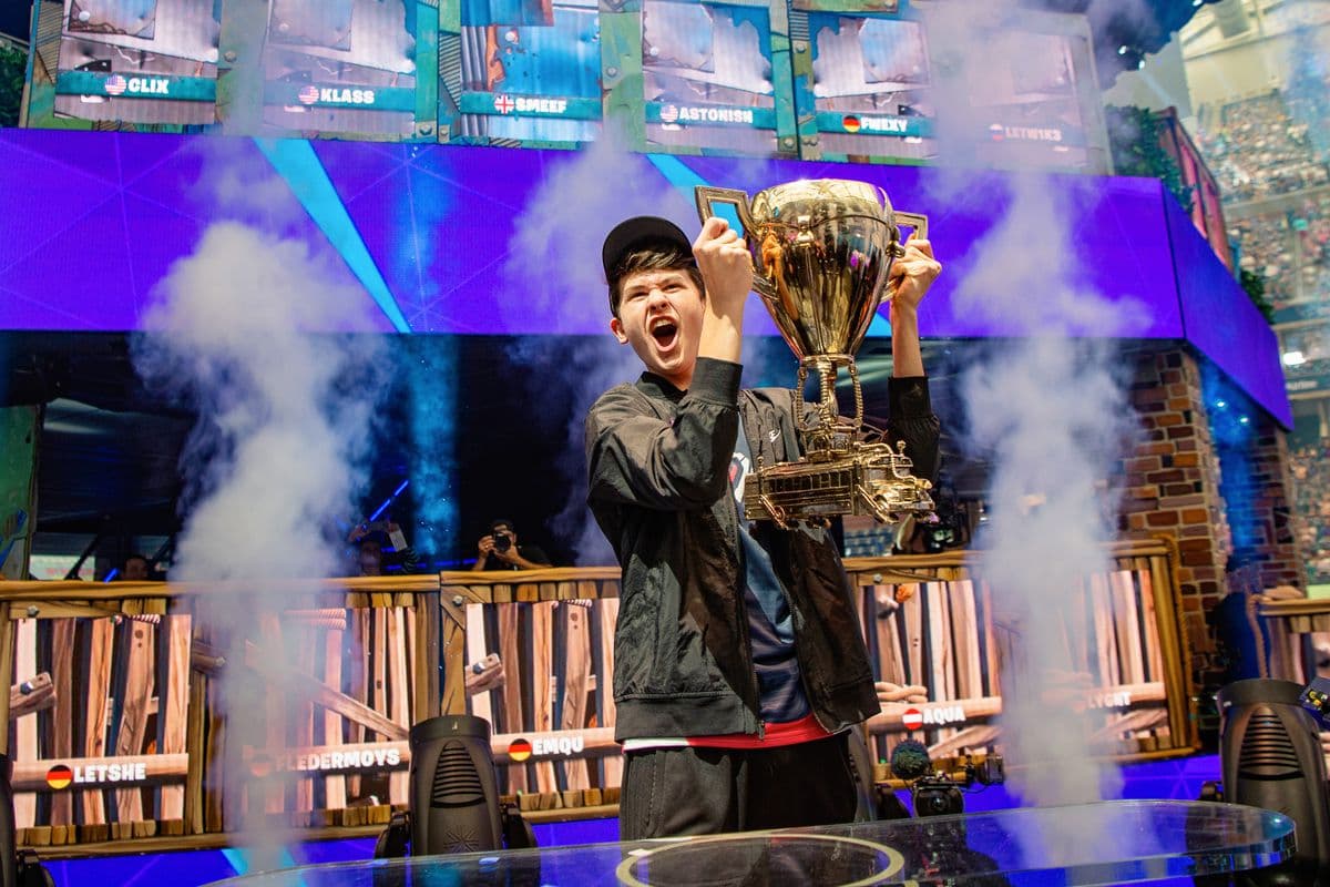Bugha lifting trophy at Fortnite World Cup 2019