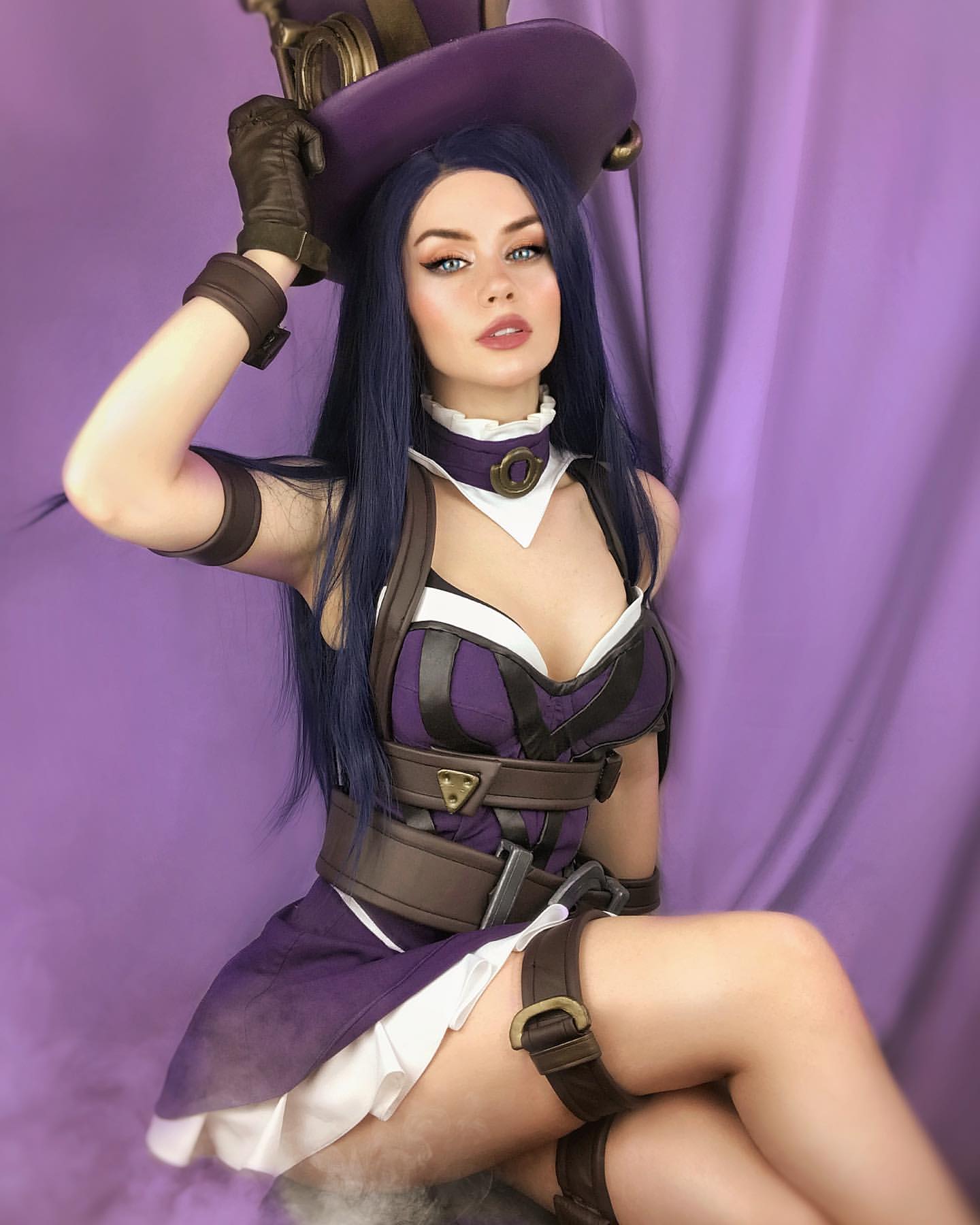 Angie Arrow's Caitlyn cosplay hit all the right targets, from her huge top hat to her purple dress.