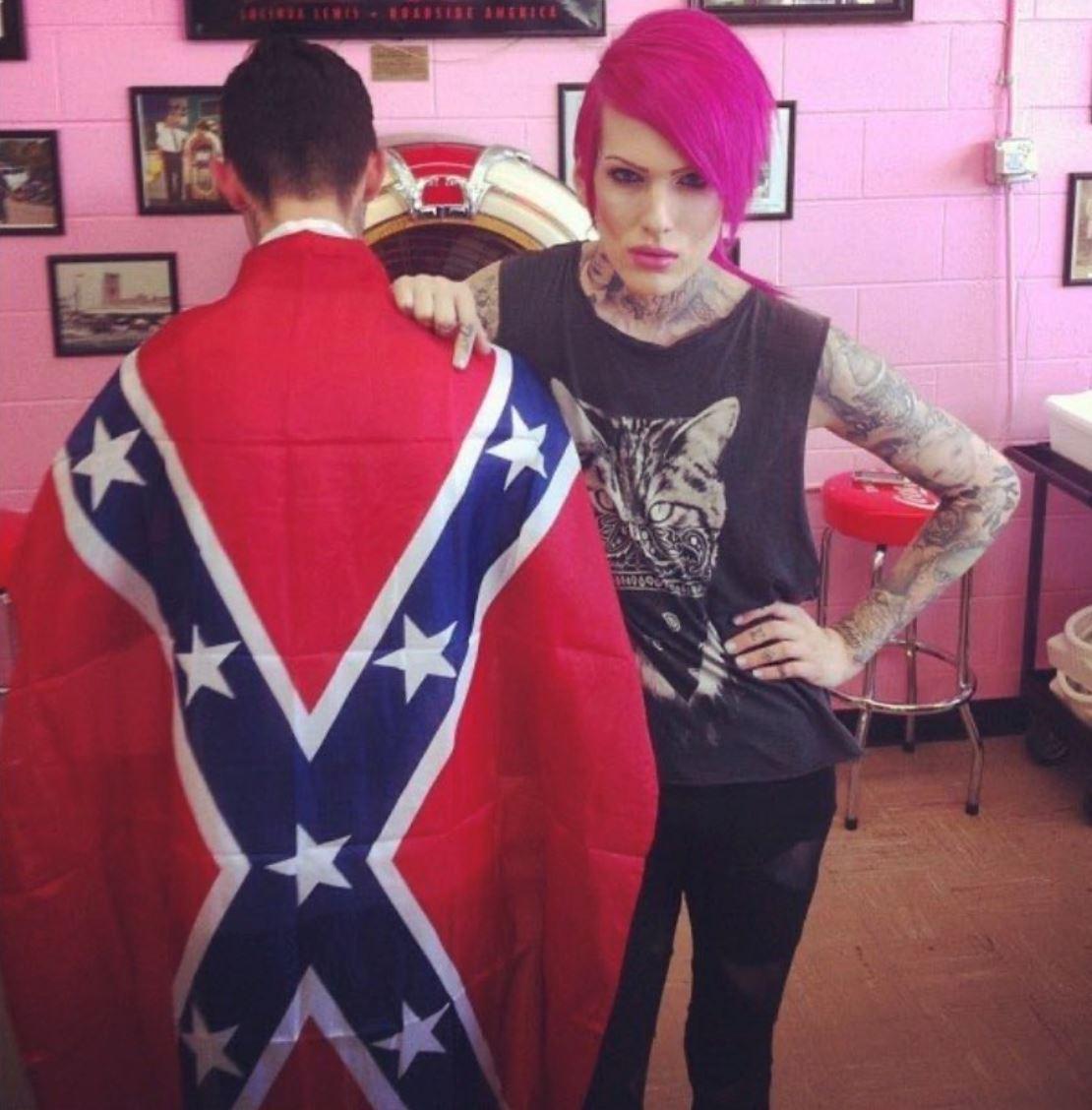 Jeffree Star poses next to fan wearing Confederate Flag