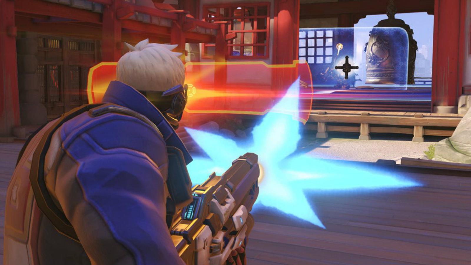 Soldier 76 attacking an enemy barrier