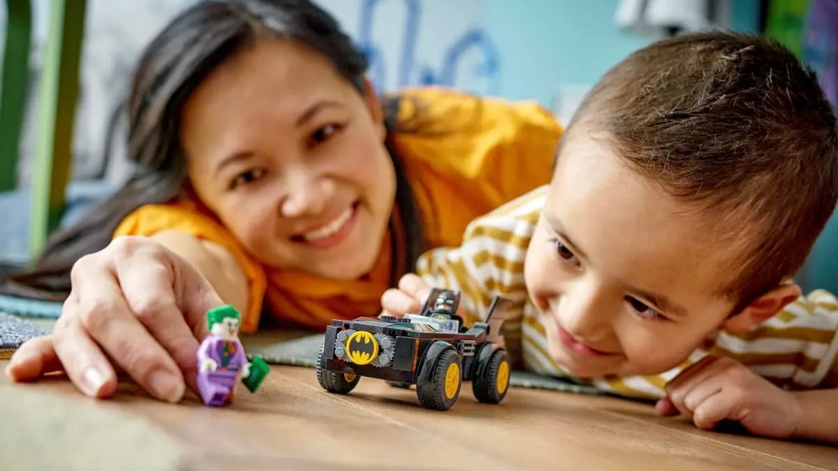 Parent and child with the Buy the LEGO Batmobile Pursuit: Batman vs The Joker at Amazon