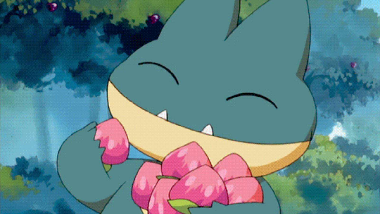The Pokemon Munchlax holds a pile of berries