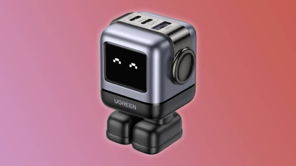 Image of the UGreen Nexode RG 65W USB Charger on a pink background.