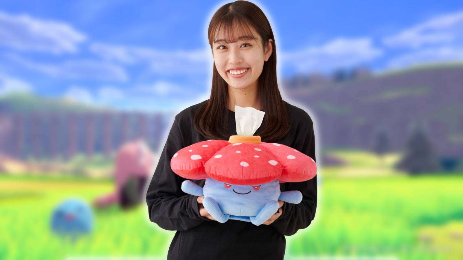 A woman holds a Vileplume plush that doubles as a toilet roll holder
