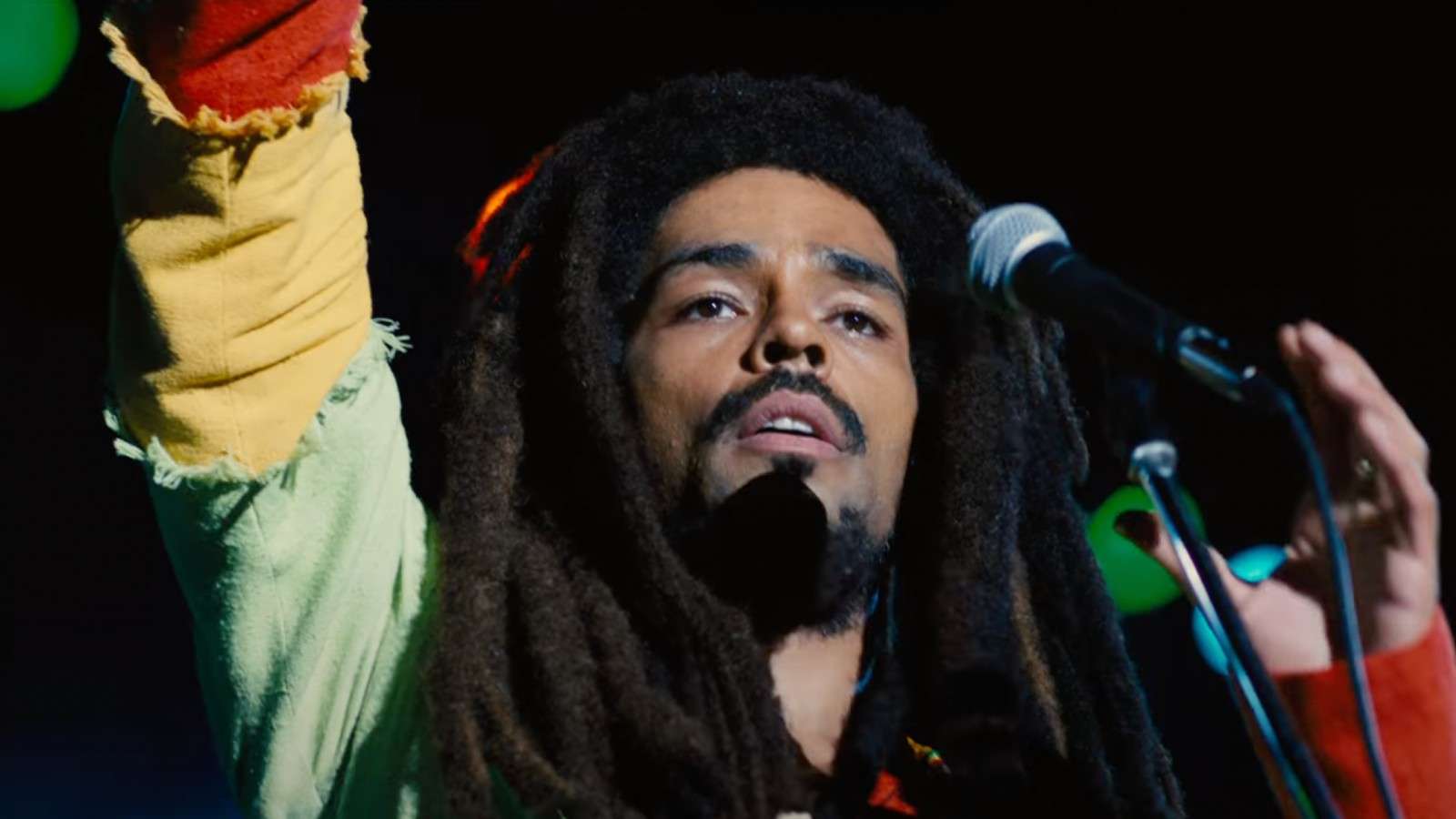 Kinglsey Ben-Adir singing onstage as Bob Marley.