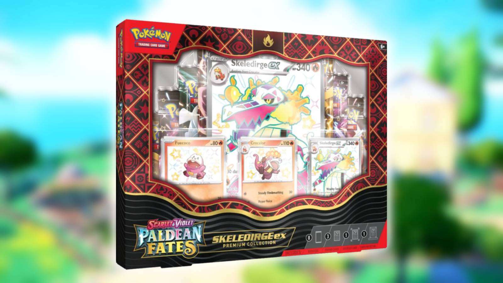 The Pokemon TCG Paldean Fates Premium Collection appears against a blurred background