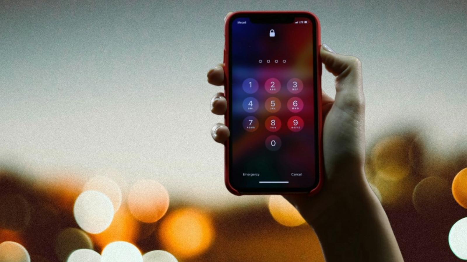 iPhone user showing a locked iPhone