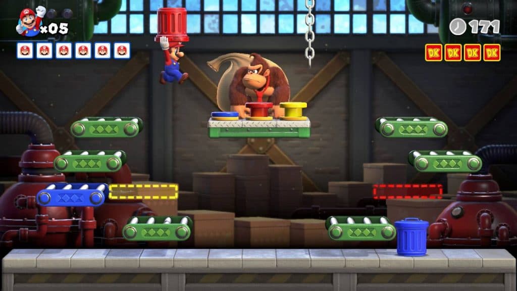 Mario throws a barrel at Donkey Kong