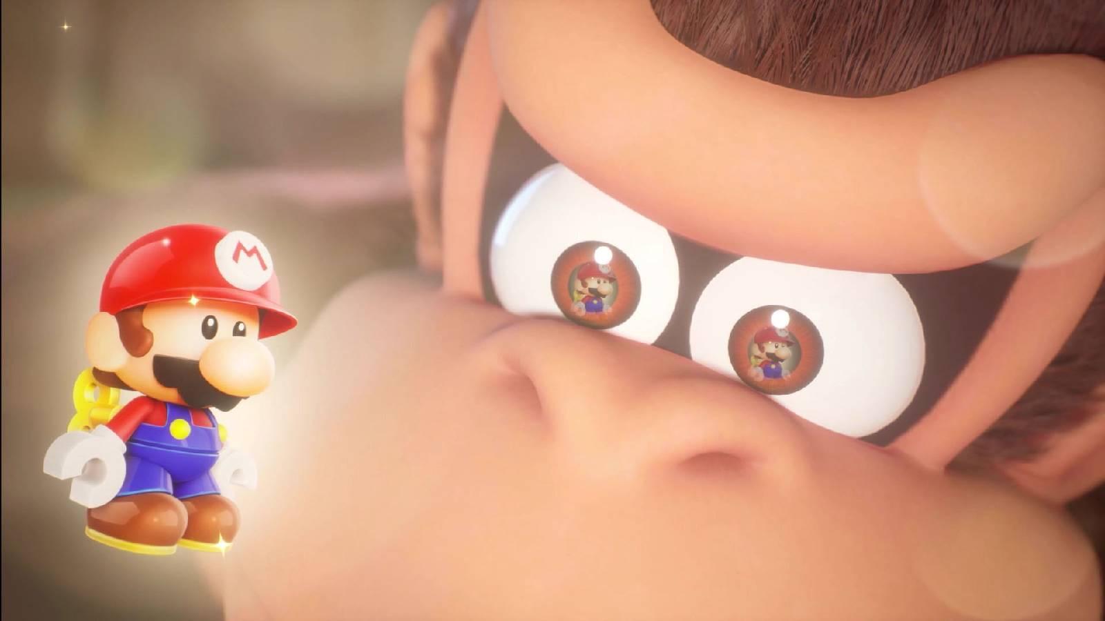A screenshot shows Donkey Kong looking at a Mini Mario