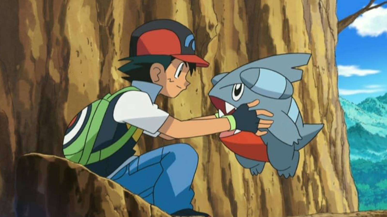 A still from the Pokemon anime shows Ask Ketchum holding up the Pokemon Gible