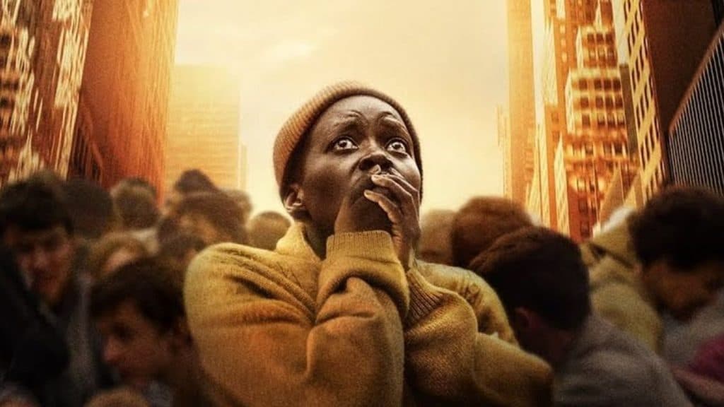 Lupita Nyong'o looks to the skies in A Quiet Place Day One.