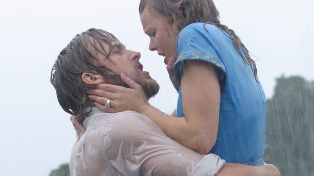 Noah (Ryan Gosling) and Allie (Rachel McAdams) kiss in The Notebook (2004)