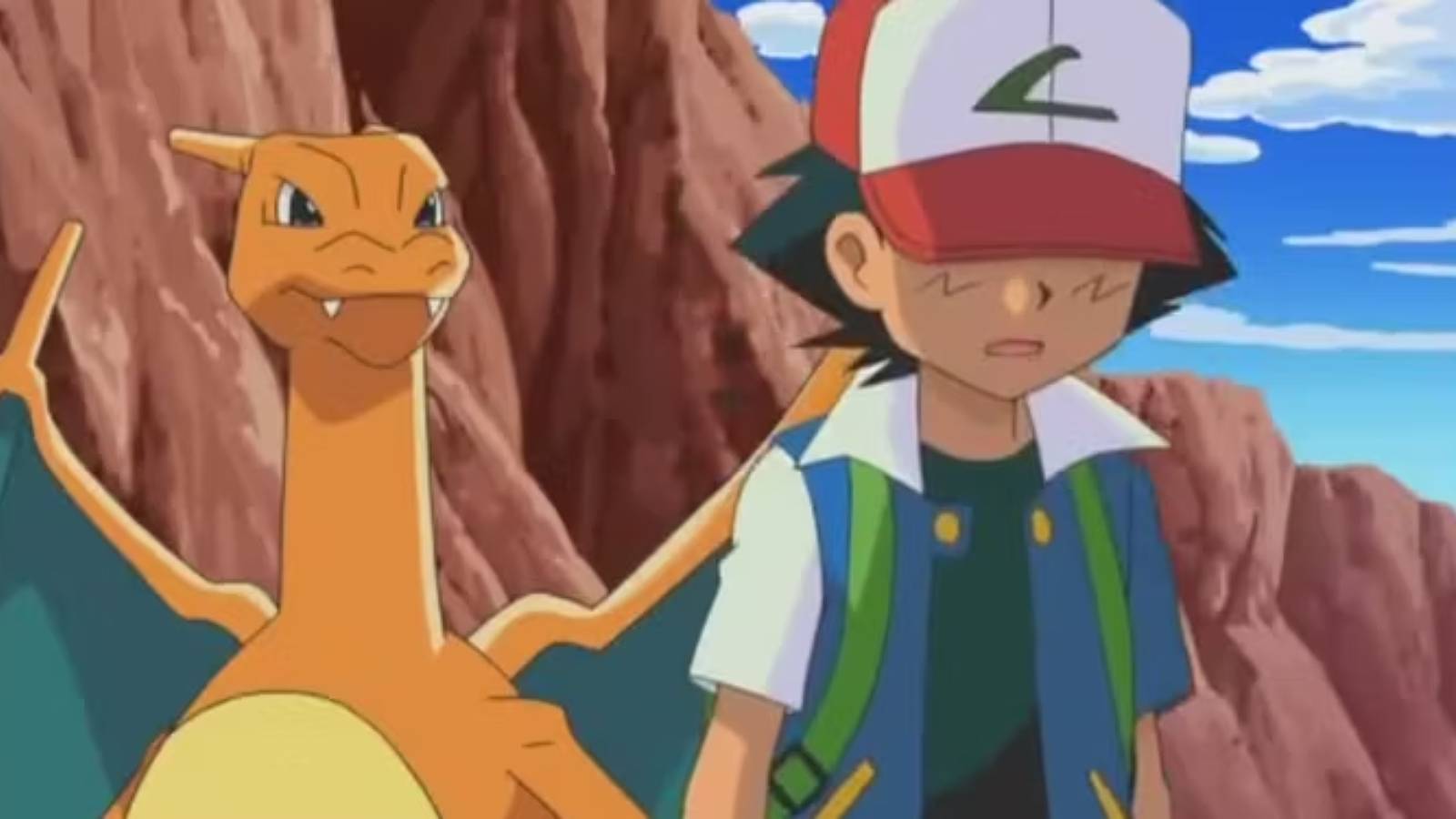 A screenshot from the Pokemon anime shows Ash walking away from Charizard