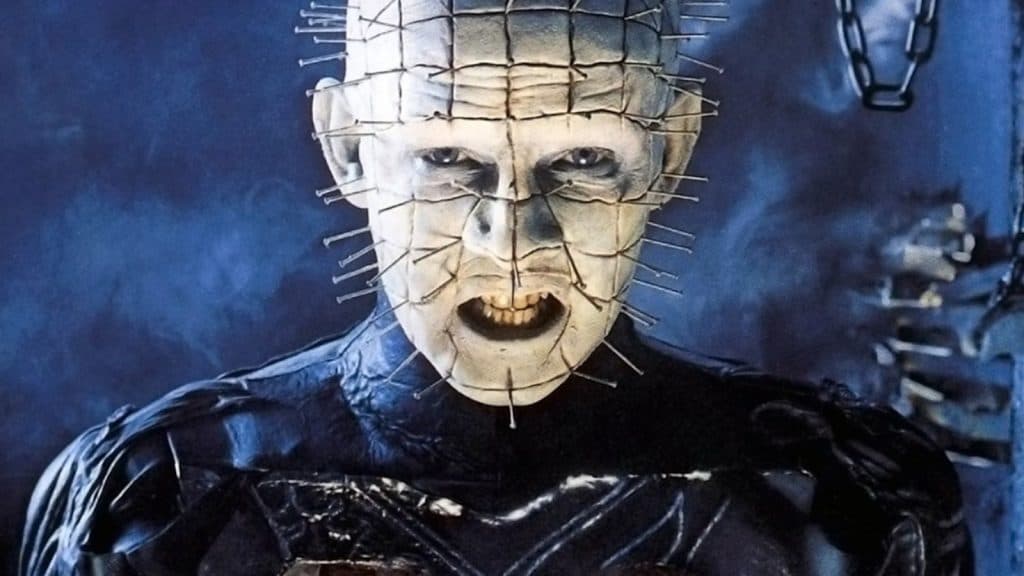 Pinhead from Hellraiser grimaces in pain.