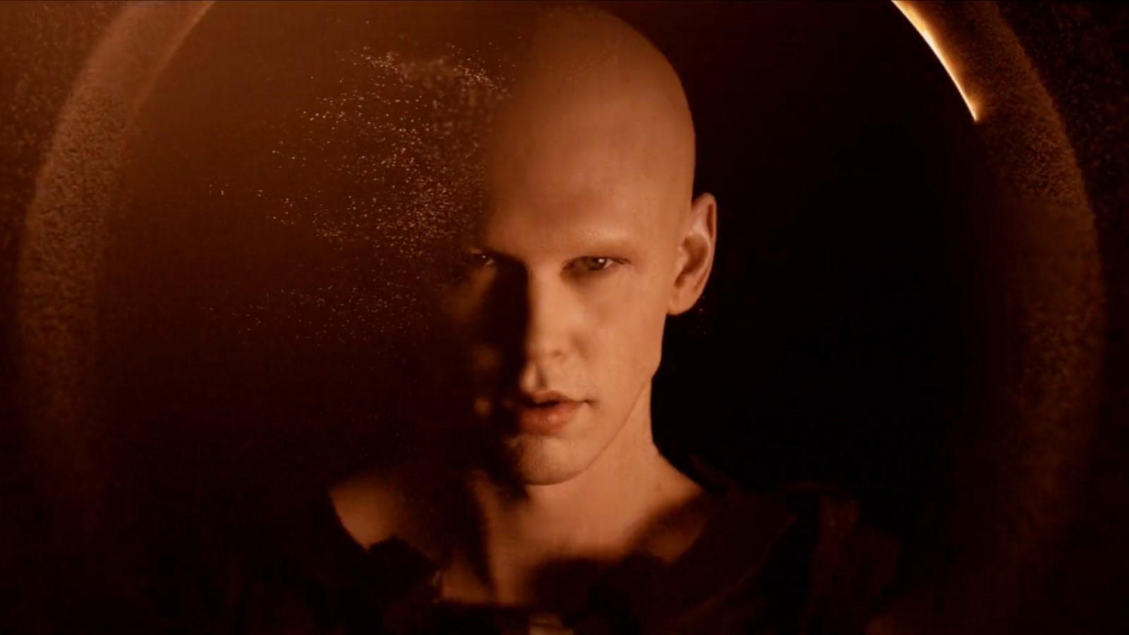 Austin Butler as Feyd-Rautha, standing in yellow light